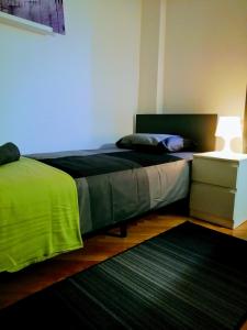 Posteľ alebo postele v izbe v ubytovaní Pula Center Arena Belvedere Apartments and Rooms