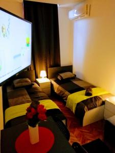 Posteľ alebo postele v izbe v ubytovaní Pula Center Arena Belvedere Apartments and Rooms
