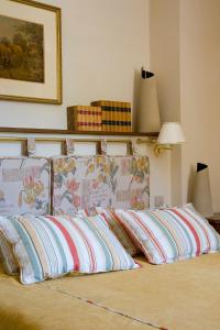 מיטה או מיטות בחדר ב-Hotel Le Viscos - Teritoria