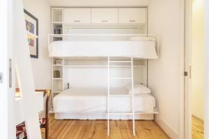 Postel nebo postele na pokoji v ubytování Bica 2 Bed Aircon UltraFast Net Fully Equipped