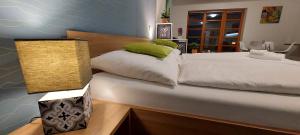 Posteľ alebo postele v izbe v ubytovaní Wellness apartmány Říčky v Orlických horách