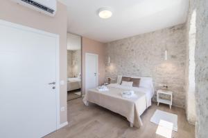 Posteľ alebo postele v izbe v ubytovaní Villa Paulina + 37 fotografií