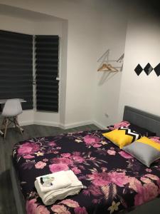 Ένα ή περισσότερα κρεβάτια σε δωμάτιο στο Norton Road