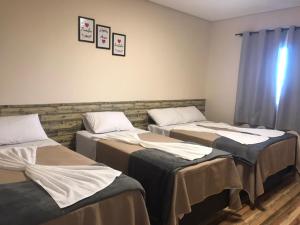 Postel nebo postele na pokoji v ubytování Pousada Morada dos Pássaros + 37 fotografií