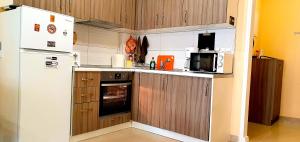 Кухня или мини-кухня в Apollo 1 - Luxury Apartment
