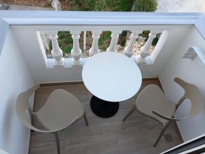 Balkón nebo terasa v ubytování Vasiliu Boutique Hotel Ksamil
