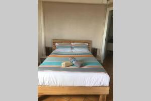 Postel nebo postele na pokoji v ubytování Le Morne Charlotte