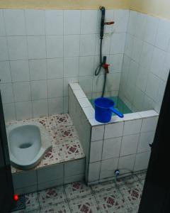 Koupelna v ubytování Hotel Gunung Mas Syariah + 37 fotografií