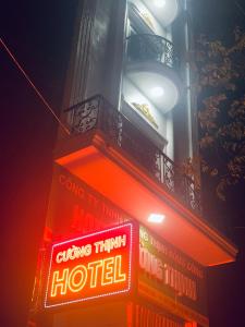 a hotel sign on the side of a building at Cường Thịnh Hotel in Na Dao Tổng +13 photos