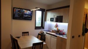 Η κουζίνα ή μικρή κουζίνα στο Apartman A7 u vili Pahulja