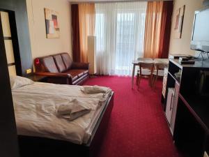 Posteľ alebo postele v izbe v ubytovaní Apartament prywatny w Hotelu Diva SPA