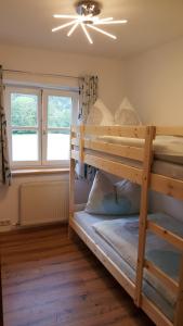 A bed or beds in a room at Hintererhof