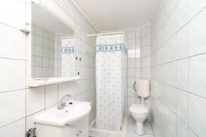 Ванная комната в Apartments Šestanović