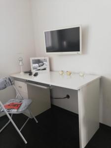 TV a/nebo společenská místnost v ubytování Apartman Klaudius