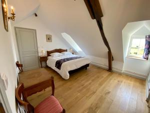 Manoir de L'Oiselière客房内的一张或多张床位