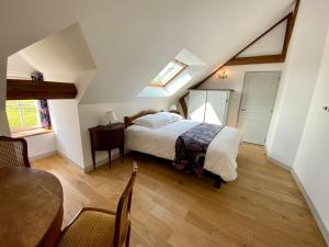 Manoir de L'Oiselière客房内的一张或多张床位