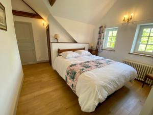 Manoir de L'Oiselière客房内的一张或多张床位