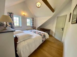Manoir de L'Oiselière客房内的一张或多张床位