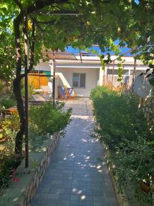 a stone walkway in front of a house at La Primavera in Anacapri