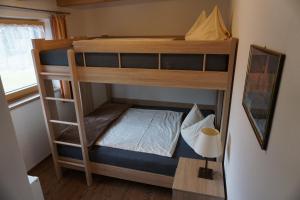 Postel nebo postele na pokoji v ubytování Appartementhaus Hüttenberger