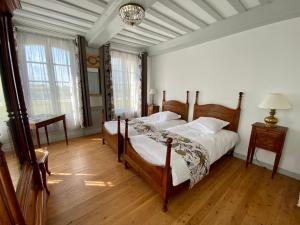 Manoir de L'Oiselière客房内的一张或多张床位