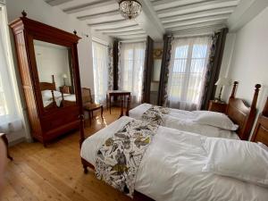 Manoir de L'Oiselière客房内的一张或多张床位