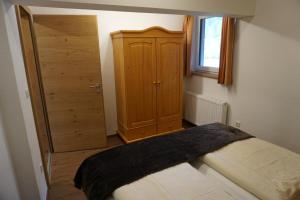 Postel nebo postele na pokoji v ubytování Appartementhaus Hüttenberger