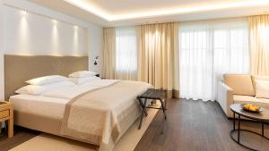Katil atau katil-katil dalam bilik di Hotel Grünauerhof