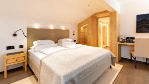 Katil atau katil-katil dalam bilik di Hotel Grünauerhof