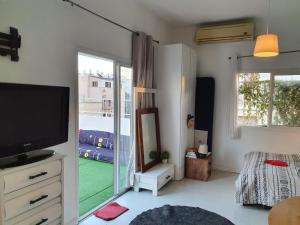 TV a/nebo společenská místnost v ubytování Hostel BU93
