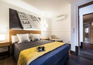 Postel nebo postele na pokoji v ubytování Garrett 48 Apartments