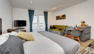 Postel nebo postele na pokoji v ubytování Apartmán Lipno - Dvě Zátoky