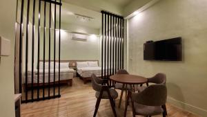 Postel nebo postele na pokoji v ubytování Yueli Homestay
