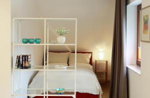 Postel nebo postele na pokoji v ubytování Landhotel Baumwipfel