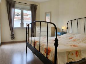 Postel nebo postele na pokoji v ubytování Appartement Monica
