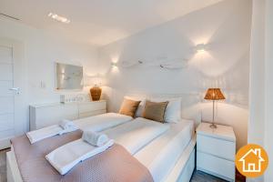Posteľ alebo postele v izbe v ubytovaní Apartamenty Promenada Gwiazd 28 - visitopl