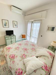Posteľ alebo postele v izbe v ubytovaní [PORTOFINO] appartamento vista mare con piscina