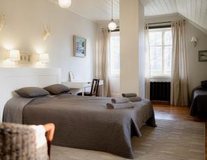 Gallery image of &Scaron;aha Kluba Apartamenti in Kuldīga