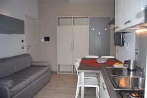 Kuchyň nebo kuchyňský kout v ubytování Orchidea Marina