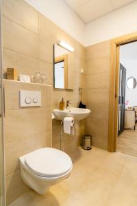 Koupelna v ubytování Via Domus + 26 fotografií