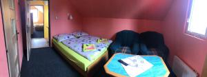 Postel nebo postele na pokoji v ubytování Hotel Na Trojce