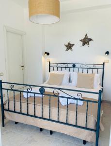 Posteľ alebo postele v izbe v ubytovaní Viestemare Resort & SPA