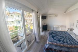 Postel nebo postele na pokoji v ubytování Auberge de la Langouste