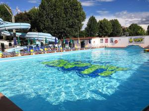 a swimming pool with a map of the earth in the water at Hotel Il Boschetto in Pistoia