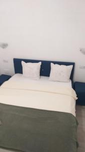 Postel nebo postele na pokoji v ubytování Sofial Guesthouse