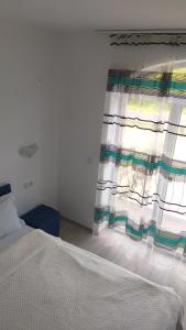 Postel nebo postele na pokoji v ubytování Sofial Guesthouse