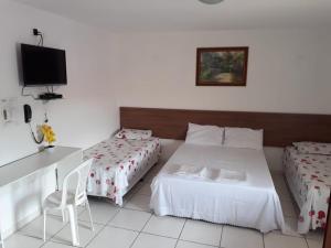 Postel nebo postele na pokoji v ubytování Pousada CERTRI + 21 fotografií