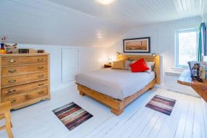 מיטה או מיטות בחדר ב-L'OASIS DU MASSIF - Spa, BBQ, foyer et plaisir !