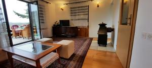 a living room with a couch and a table at PURE NATURE in Visoko +26 photos