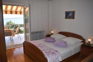 Posteľ alebo postele v izbe v ubytovaní Rooms Raos